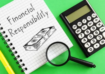 a notebook that says 'financial responsibility'